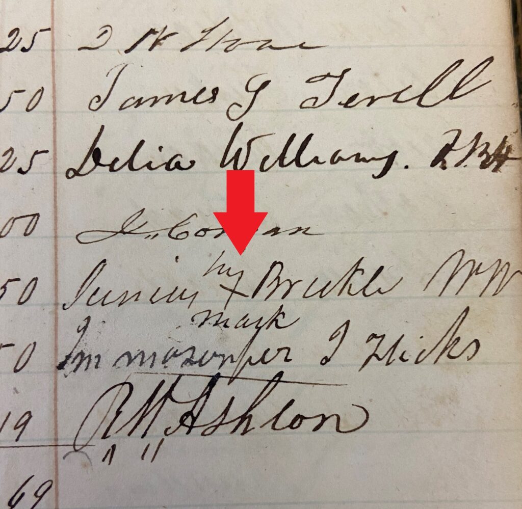 Handwritten source showing Junius Brickle's mark with a red arrow